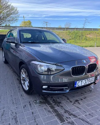 samochody osobowe BMW Seria 1 cena 34500 przebieg: 230000, rok produkcji 2014 z Toruń